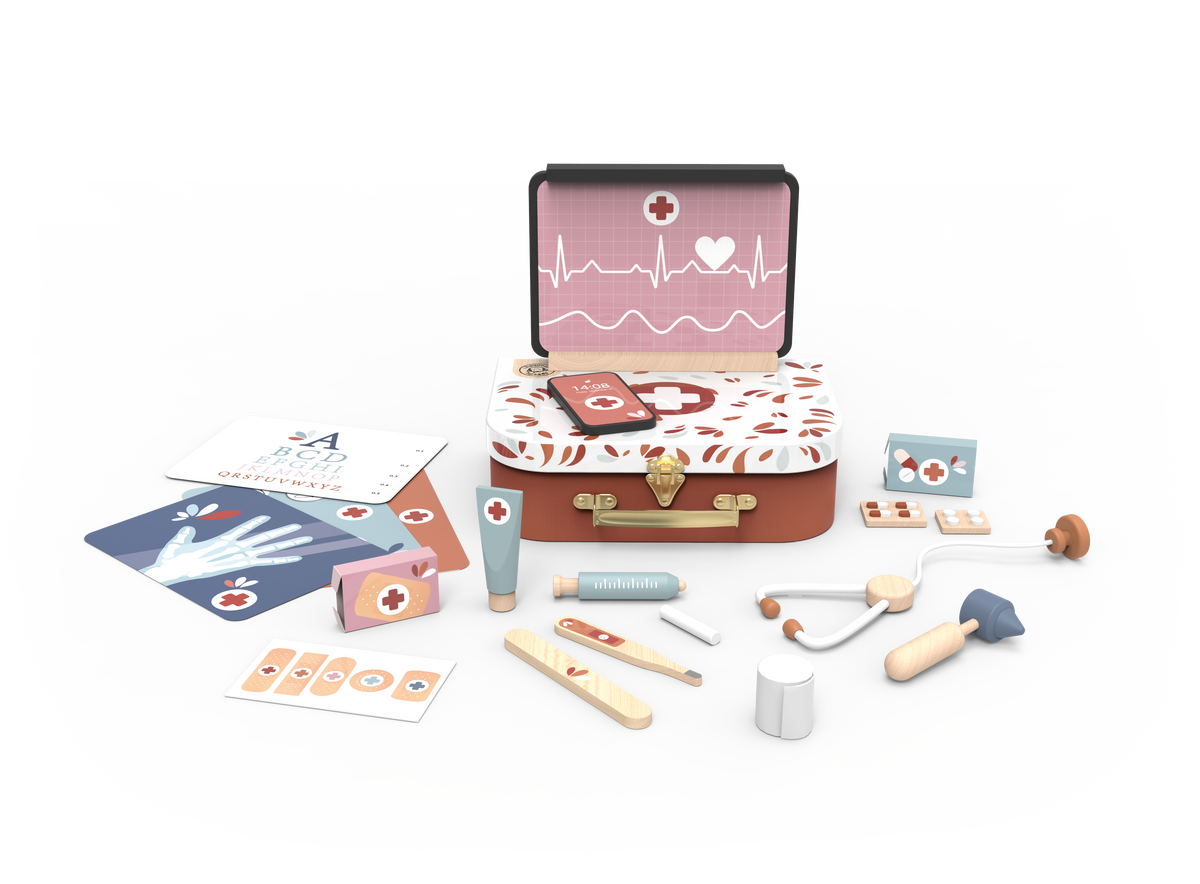 Children's toy medical kit with various accessories on a gray background