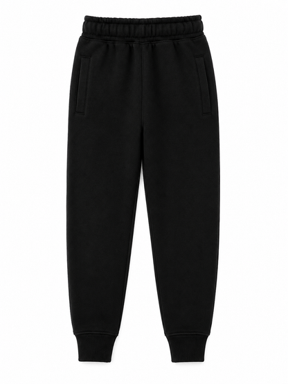 Black sweatpants with an elastic waistband, side pockets, and ribbed ankle cuffs, shown flat against a white background.