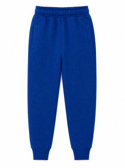 A pair of royal blue sweatpants with an elastic waistband, side pockets, and ribbed ankle cuffs, shown flat against a white background.