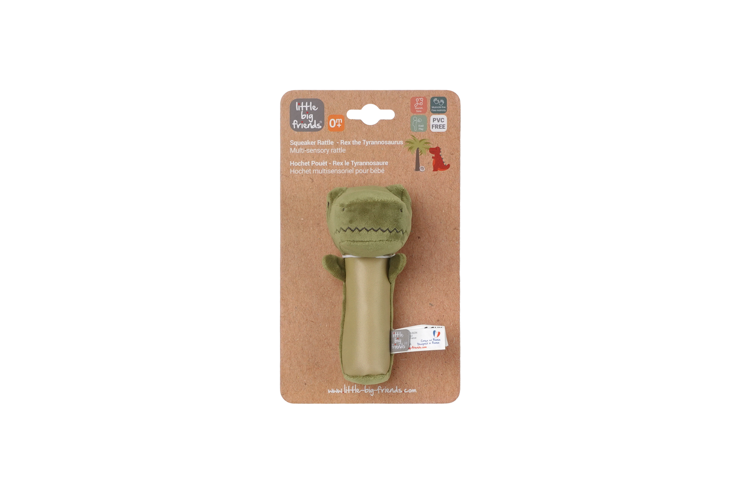 Green dino toy on a cardboard packaging with brand logo