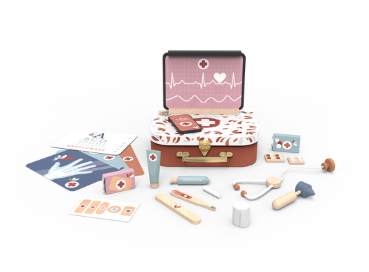 Children's toy medical kit with various accessories on a gray background