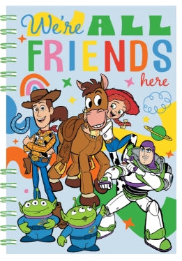 A colorful spiral-bound notebook featuring Toy Story characters and the text 'We're ALL FRIENDS here' on a bright multicolor background.
